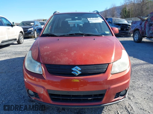 2009 Suzuki SX4 Touring AWD z VIN JS2YB417595100925, wystawiony jako IAAI lot #41693882 z przebiegiem 76 972 mil mil oraz . Historia ofert i sprzedaży dostępna na DreamBid. Obrazek 13.
