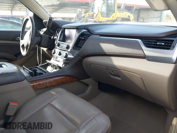 2015 Chevrolet Suburban LTZ with VIN 1GNSCKKC2FR741040, listed as a IAAI auction lot 41709574 with 87,795 mi miles and . Bid and sale history available at DreamBid. Image 5.