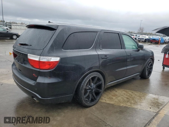 2013 Dodge Durango R/T with VIN 1C4SDHCTXDC520650, listed as a Copart auction lot 49253535 with 146,201 mi miles and Clean title. Bid and sale history available at DreamBid. Image 3.