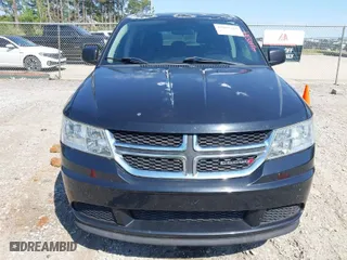 2013 Dodge Journey SE with VIN 3C4PDCAB3DT529696, listed as a IAAI auction lot 41885319 with 130,947 mi miles. Bid and sale history available at carsss.com. Image 6.