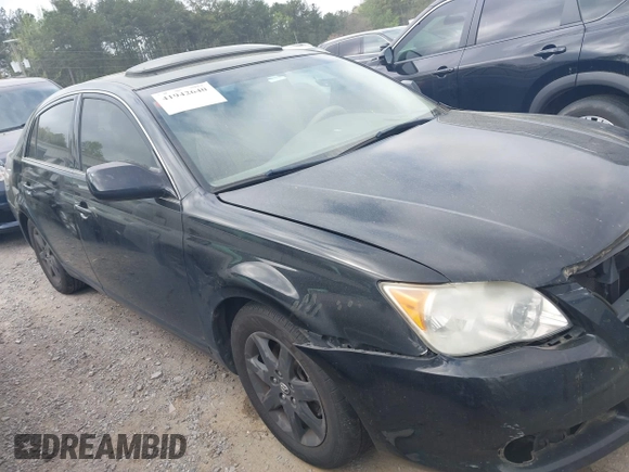 2010 Toyota Avalon XL with VIN 4T1BK3DB8AU358260, listed as a IAAI auction lot 41942640 with 230,584 mi miles and . Bid and sale history available at carsss.com. Image 13.