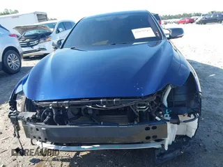 2021 Infiniti Q50 Luxe z VIN JN1EV7BP4MM706934, wystawiony jako IAAI lot #42079747 z przebiegiem 102 821 mil mil oraz . Historia ofert i sprzedaży dostępna na DreamBid. Obrazek 13.