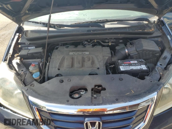 2009 Honda Odyssey LX z VIN 5FNRL38209B051664, wystawiony jako Copart lot #56710125 z przebiegiem 123 mil mil oraz Nie do naprawy • Non repairable. Historia ofert i sprzedaży dostępna na DreamBid. Obrazek 12.