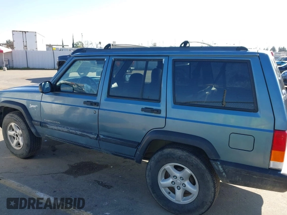 1998 Jeep Cherokee Sport with VIN 1J4FT68S0WL231959, listed as a IAAI auction lot 41680076 with 252,369 mi miles. Bid and sale history available at carsss.com. Image 14.
