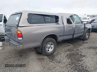 2000 Toyota Tundra SR5 with VIN 5TBRT3414YS086059, listed as a IAAI auction lot 41609962 with 105,030 mi miles and . Bid and sale history available at DreamBid. Image 4.