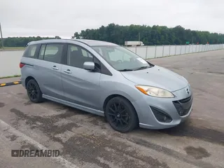 2012 Mazda 5 Touring z VIN JM1CW2CL7C0115096, wystawiony jako IAAI lot #42524956 z przebiegiem 173 155 mil mil oraz . Historia ofert i sprzedaży dostępna na DreamBid. Obrazek 1.