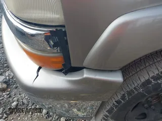 2002 Chevrolet Tahoe LS z VIN 1GNEC13Z22R197594, wystawiony jako IAAI lot #41475477 z przebiegiem 384 968 mil mil oraz . Historia ofert i sprzedaży dostępna na DreamBid. Obrazek 6.