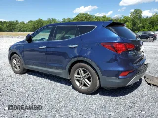 2017 Hyundai Santa Fe 2.4L z VIN 5XYZT3LB2HG496566, wystawiony jako Copart lot #57759925 z przebiegiem 129 094 mil mil oraz Szkoda całkowita • Salvage title. Historia ofert i sprzedaży dostępna na DreamBid. Obrazek 2.