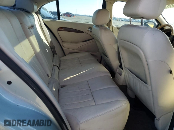 2003 Jaguar S-Type with VIN SAJEA01T93FM46260, listed as a Copart auction lot 87573835 with 129,563 mi miles and Clean Title. Bid and sale history available at DreamBid. Image 10.