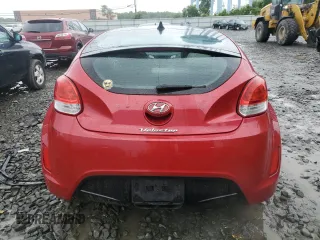 2013 Hyundai Veloster w/Gray Int z VIN KMHTC6AD0DU147454, wystawiony jako Copart lot #57814285 z przebiegiem 91 000 mil mil oraz Szkoda całkowita • Salvage title. Historia ofert i sprzedaży dostępna na DreamBid. Obrazek 6.