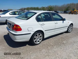 2003 BMW 3 Series 325i with VIN WBAET37403NJ38665, listed as a IAAI auction lot 41725205 with 267,000 mi miles and . Bid and sale history available at DreamBid. Image 4.