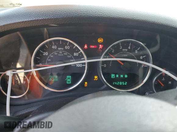 2013 Jeep Wrangler Unlimited Sport with VIN 1C4BJWDG4DL628518, listed as a Copart auction lot 65029795 with 142,852 mi miles and Salvage title. Bid and sale history available at DreamBid. Image 9.
