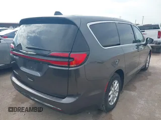 2023 Chrysler Pacifica Touring L with VIN 2C4RC1BG8PR594481, listed as a IAAI auction lot 42618839 with 60,748 mi miles and . Bid and sale history available at DreamBid. Image 4.