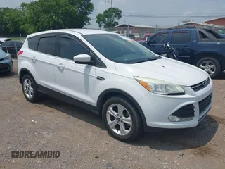 2016 Ford Escape SE z VIN 1FMCU0G97GUB03985, wystawiony jako IAAI lot #42411945 z przebiegiem 128 017 mil mil oraz . Historia ofert i sprzedaży dostępna na DreamBid. Obrazek 1.