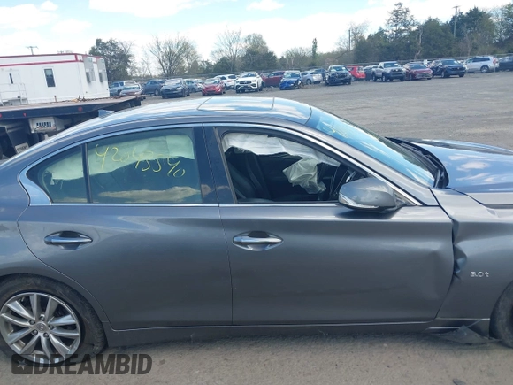 2017 Infiniti Q50 3.0t Premium with VIN JN1EV7AR7HM832617, listed as a IAAI auction lot 42043540 with 94,807 mi miles. Bid and sale history available at carsss.com. Image 13.