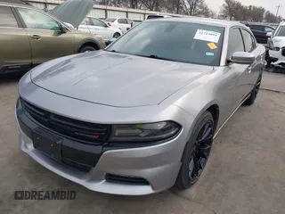 2015 Dodge Charger SXT with VIN 2C3CDXHG4FH884058, listed as a IAAI auction lot 41724894 with 202,701 mi miles and . Bid and sale history available at DreamBid. Image 2.