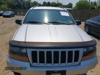 2004 Jeep Grand Cherokee Laredo with VIN 1J4GW48S94C369643, listed as a IAAI auction lot 42693998 with 225,033 mi miles and . Bid and sale history available at DreamBid. Image 6.