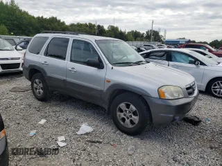 2004 Mazda Tribute ES with VIN 4F2CZ96104KM18818, listed as a Copart auction lot 68863884 with 317,983 mi miles and Salvage Title. Bid and sale history available at carsss.com. Image 4.