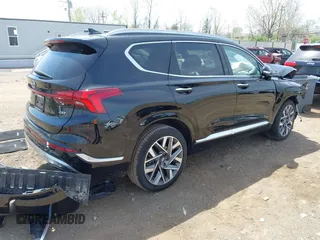 2023 Hyundai Santa Fe Calligraphy z VIN 5NMS54AL2PH607408, wystawiony jako IAAI lot #42094479 z przebiegiem 28 525 mil mil oraz . Historia ofert i sprzedaży dostępna na DreamBid. Obrazek 4.