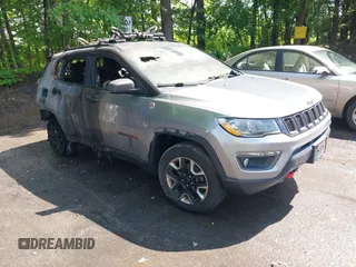 2018 Jeep Compass Trailhawk with VIN 3C4NJDDB5JT130317, listed as a IAAI auction lot 42470070 with 95,000 mi miles and . Bid and sale history available at DreamBid. Image 1.