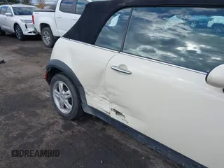 2006 MINI Convertible with VIN WMWRF33566TF65410, listed as a IAAI auction lot 40813052 with 131,109 mi miles and . Bid and sale history available at DreamBid. Image 6.