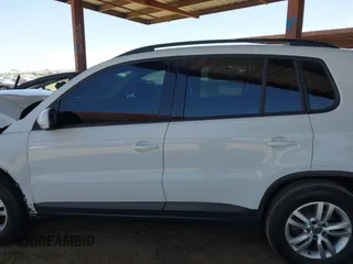 2017 Volkswagen Tiguan S with VIN WVGAV7AXXHK026143, listed as a IAAI auction lot 42257624 with 87,327 mi miles and . Bid and sale history available at DreamBid. Image 14.