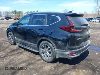 2020 Honda CR-V Touring with VIN 2HKRW2H98LH660573, listed as a IAAI auction lot 41524610 with 37,493 mi miles and . Bid and sale history available at DreamBid. Image 14.