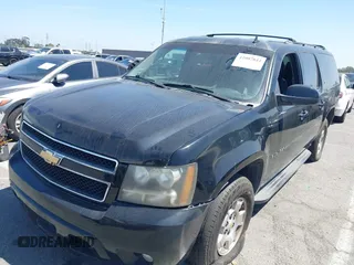 2011 Chevrolet Suburban LT with VIN 1GNSCJE0XBR285973, listed as a IAAI auction lot 42007844 with 252,994 mi miles. Bid and sale history available at carsss.com. Image 2.