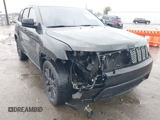 2021 Jeep Grand Cherokee Laredo X with VIN 1C4RJEAG1MC680282, listed as a IAAI auction lot 41466496 with 58,855 mi miles and . Bid and sale history available at DreamBid. Image 6.