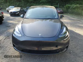 2024 Tesla Model Y Long Range with VIN 7SAYGDEE4RA299503, listed as a Copart auction lot 61950585 with 17,077 mi miles and Salvage title. Bid and sale history available at DreamBid. Image 5.