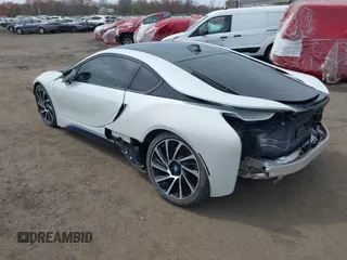 2016 BMW i8 with VIN WBY2Z2C53GV675600, listed as a IAAI auction lot 42079477 with 26,756 mi miles. Bid and sale history available at carsss.com. Image 3.