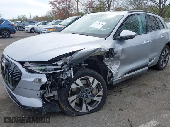 2022 Audi e-tron Premium with VIN WA1AAAGE3NB033122, listed as a IAAI auction lot 42081343 with 36,171 mi miles and . Bid and sale history available at DreamBid. Image 2.