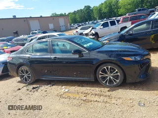 2018 Toyota Camry LE z VIN 4T1B11HKXJU652275, wystawiony jako IAAI lot #42245625 z przebiegiem 49 596 mil mil oraz . Historia ofert i sprzedaży dostępna na DreamBid. Obrazek 13.