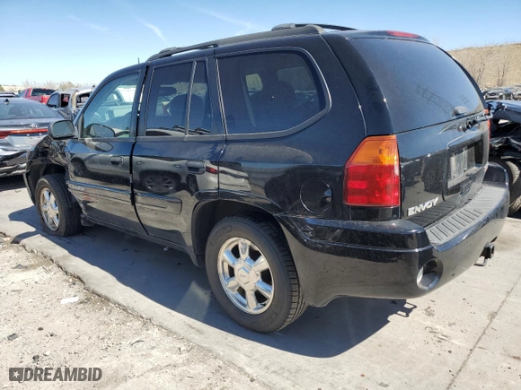 2005 GMC Envoy SLE with VIN 1GKDT13S752390266, listed as a Copart auction lot 50766935 with 115,225 mi miles and Salvage Title. Bid and sale history available at carsss.com. Image 2.