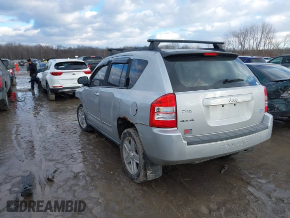 2010 Jeep Compass Sport with VIN 1J4NF4FB3AD589361, listed as a IAAI auction lot 41449412 with 127,807 mi miles. Bid and sale history available at carsss.com. Image 3.