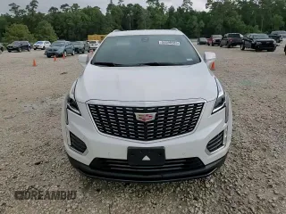 2024 Cadillac XT5 FWD Luxury with VIN 1GYKNAR4XRZ747310, listed as a Copart auction lot 55598585 with 14,371 mi miles and Salvage title. Bid and sale history available at DreamBid. Image 14.