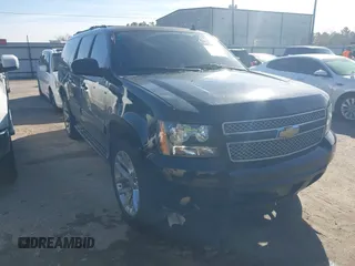 2014 Chevrolet Suburban LT with VIN 1GNSKJE7XER164316, listed as a IAAI auction lot 41306117 with 240,445 mi miles and . Bid and sale history available at DreamBid. Image 1.