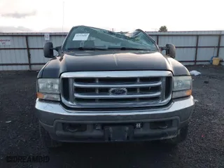 2004 Ford Super Duty F-250 XL with VIN 1FTNW21S24EA89210, listed as a IAAI auction lot 41219466 with 169,983 mi miles. Bid and sale history available at carsss.com. Image 12.