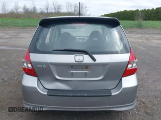 2007 Honda Fit Sport z VIN JHMGD38687S017199, wystawiony jako IAAI lot #42156912 z przebiegiem 194 685 mil mil oraz . Historia ofert i sprzedaży dostępna na DreamBid. Obrazek 17.