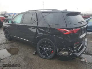 2023 Chevrolet Traverse Premier with VIN 1GNERKKWXPJ121140, listed as a Copart auction lot 84128344 with 54,853 mi miles and Salvage Title. Bid and sale history available at carsss.com. Image 2.