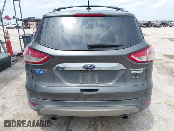 2015 Ford Escape Titanium z VIN 1FMCU0JX3FUA71770, wystawiony jako IAAI lot #42085635 z przebiegiem 141 890 mil mil oraz . Historia ofert i sprzedaży dostępna na DreamBid. Obrazek 16.