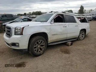 2019 GMC Yukon XL SLE z VIN 1GKS2FKCXKR386913, wystawiony jako Copart lot #74572604 z przebiegiem 133 499 mil mil oraz Nie do naprawy • Non repairable. Historia ofert i sprzedaży dostępna na DreamBid. Obrazek 1.