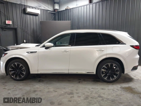 2024 Mazda CX-90 S Premium z VIN JM3KKDHCXR1103272, wystawiony jako IAAI lot #40301969 z przebiegiem 5 235 mil mil oraz . Historia ofert i sprzedaży dostępna na DreamBid. Obrazek 15.
