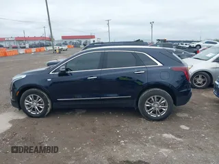 2021 Cadillac XT5 AWD Premium Luxury with VIN 1GYKNDRS6MZ147571, listed as a IAAI auction lot 41864286 with 46,144 mi miles. Bid and sale history available at carsss.com. Image 14.