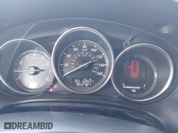 2015 Mazda CX-5 Grand Touring with VIN JM3KE4DY7F0481883, listed as a IAAI auction lot 42091709 with 184,248 mi miles and . Bid and sale history available at DreamBid. Image 7.