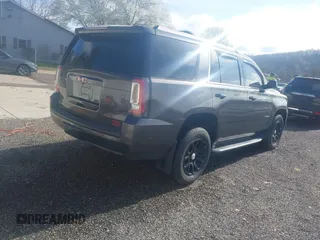 2016 GMC Yukon SLE with VIN 1GKS2AKC9GR273724, listed as a IAAI auction lot 41945761 with 141,425 mi miles. Bid and sale history available at carsss.com. Image 4.