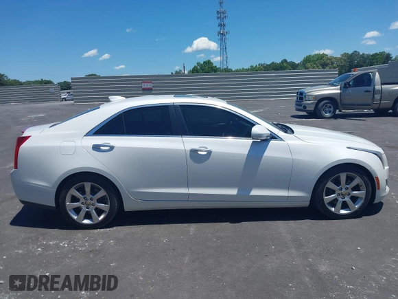 2016 Cadillac ATS Luxury Collection RWD z VIN 1G6AB5RX4G0133529, wystawiony jako IAAI lot #42314146 z przebiegiem 158 897 mil mil oraz . Historia ofert i sprzedaży dostępna na DreamBid. Obrazek 13.