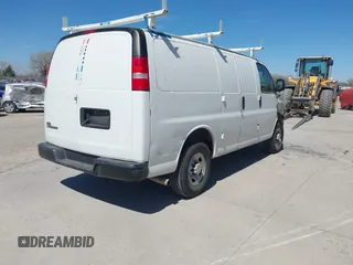 2018 Chevrolet Express Cargo Van with VIN 1GCWGAFP6J1332570, listed as a IAAI auction lot 41482103 with 142,405 mi miles. Bid and sale history available at carsss.com. Image 4.