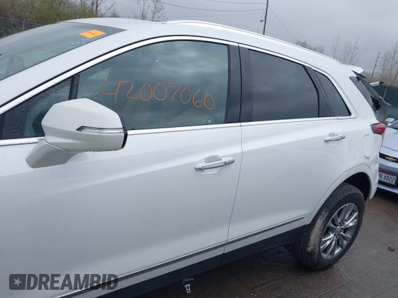 2023 Cadillac XT5 AWD Premium Luxury with VIN 1GYKNDR43PZ102819, listed as a IAAI auction lot 42007060 with 16,606 mi miles and . Bid and sale history available at DreamBid. Image 14.