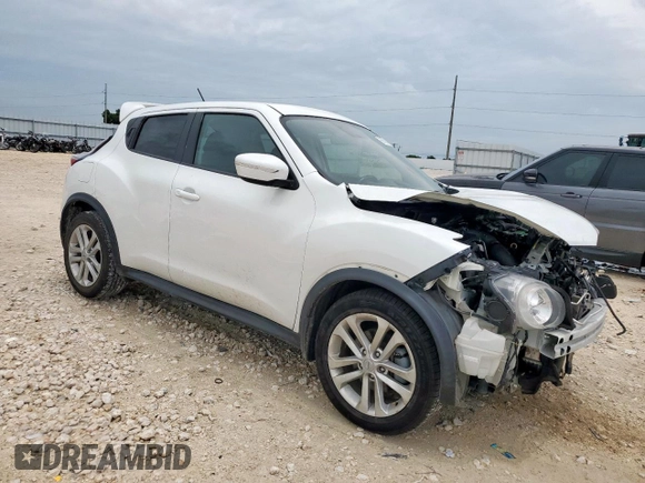 2015 Nissan Juke SV with VIN JN8AF5MR0FT507856, listed as a Copart auction lot 60616415 with 79,475 mi miles and Salvage title. Bid and sale history available at DreamBid. Image 4.